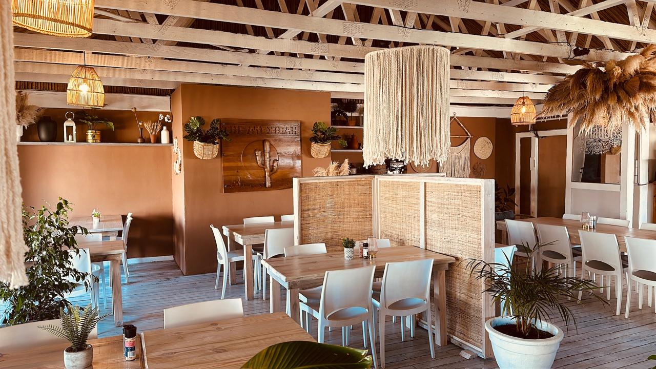 Inside The Mexican — natural timber, warm walls, soft light